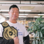 toda-san photo with the champion belt